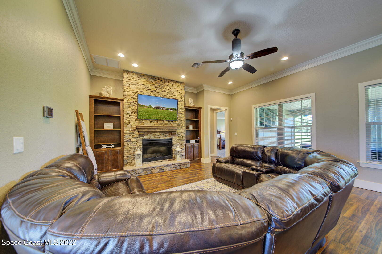 3500 Aurantia Road Mims, FL 32754 - Photo 25 of 55 Family Room with Fireplace & Built-in Bo