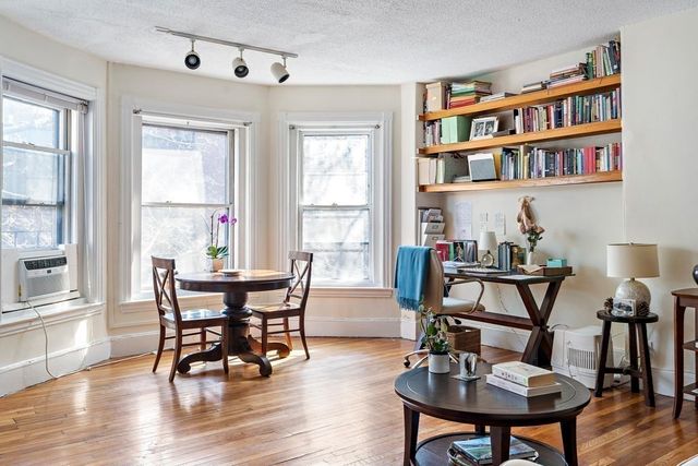 a view of a livingroom and dining room