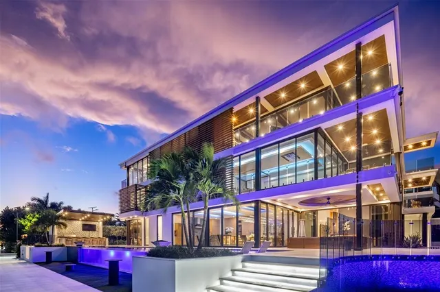 a view of a swimming pool with seating space