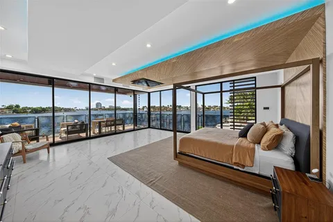 a view of a roof deck with outdoor seating and city view