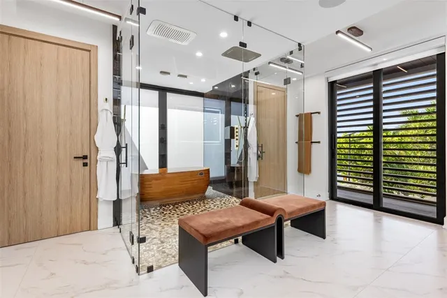 a room with gym equipment and window