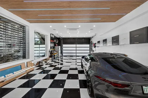 a view of a house with swimming pool outdoor seating