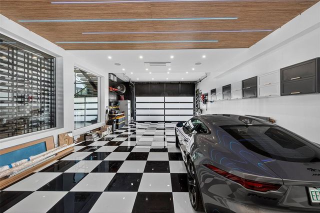 a view of a house with swimming pool outdoor seating
