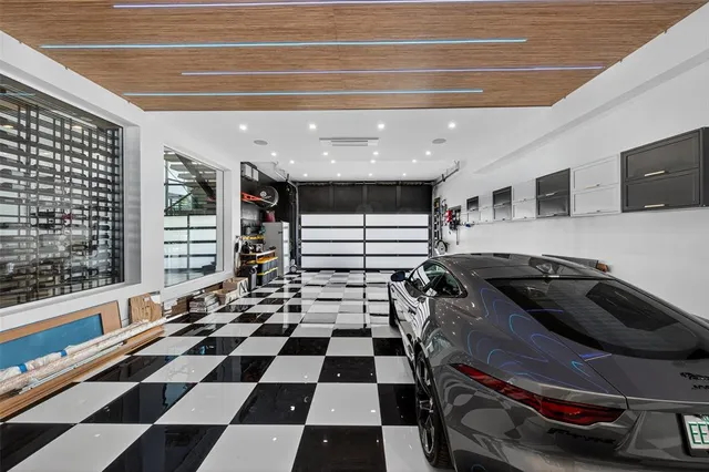 a view of a house with swimming pool outdoor seating