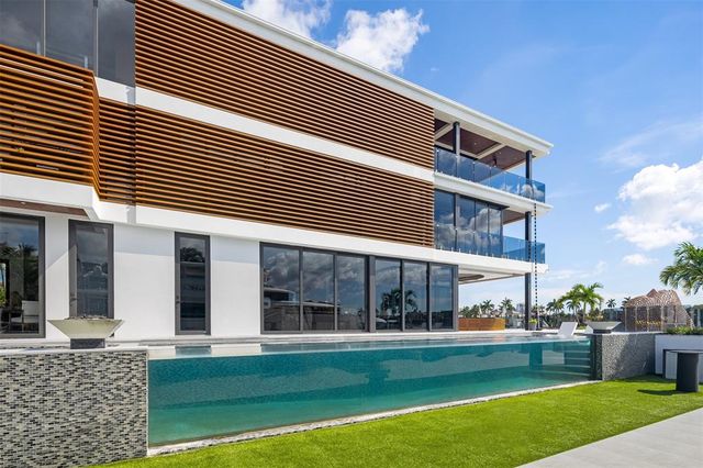 a view of an chairs and tables in the patio