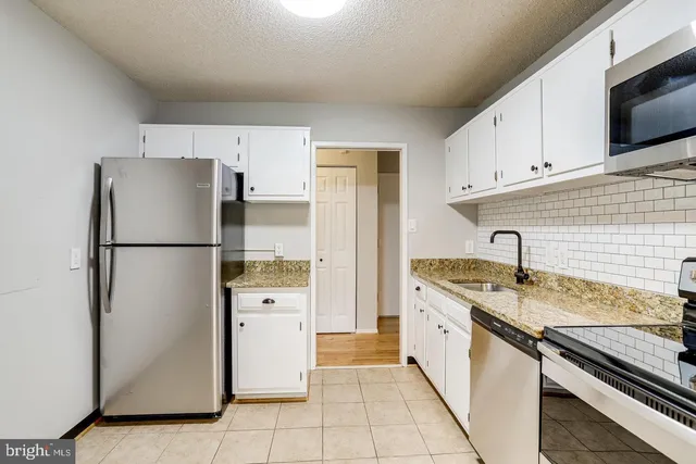 $258,000 | 2300 Pimmit Drive, Unit 102, Falls Church, VA 22043