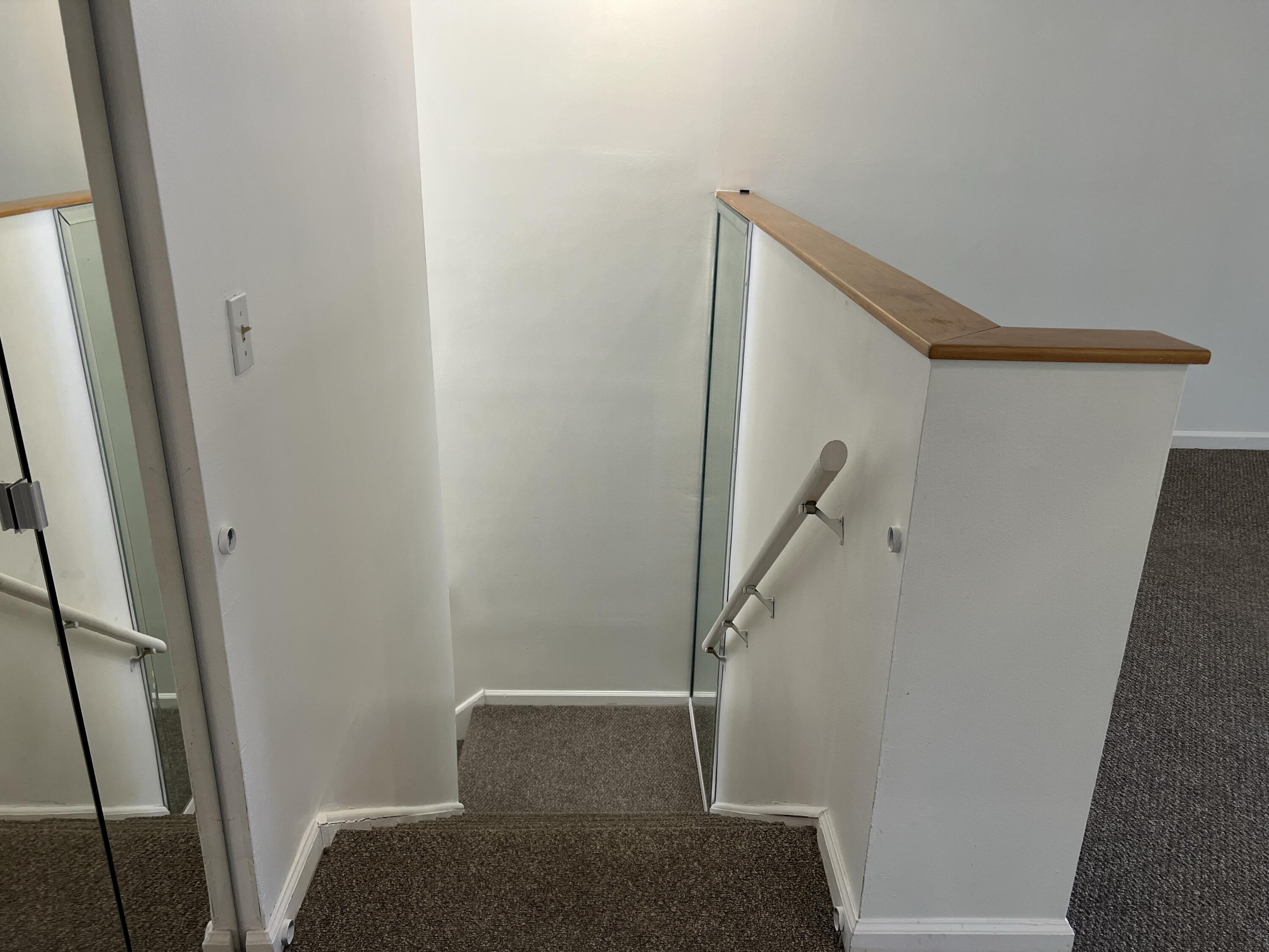 6622 Via Regina Boca Raton, FL 33433 - Photo 13 of 29 Staircase down to main Entrance