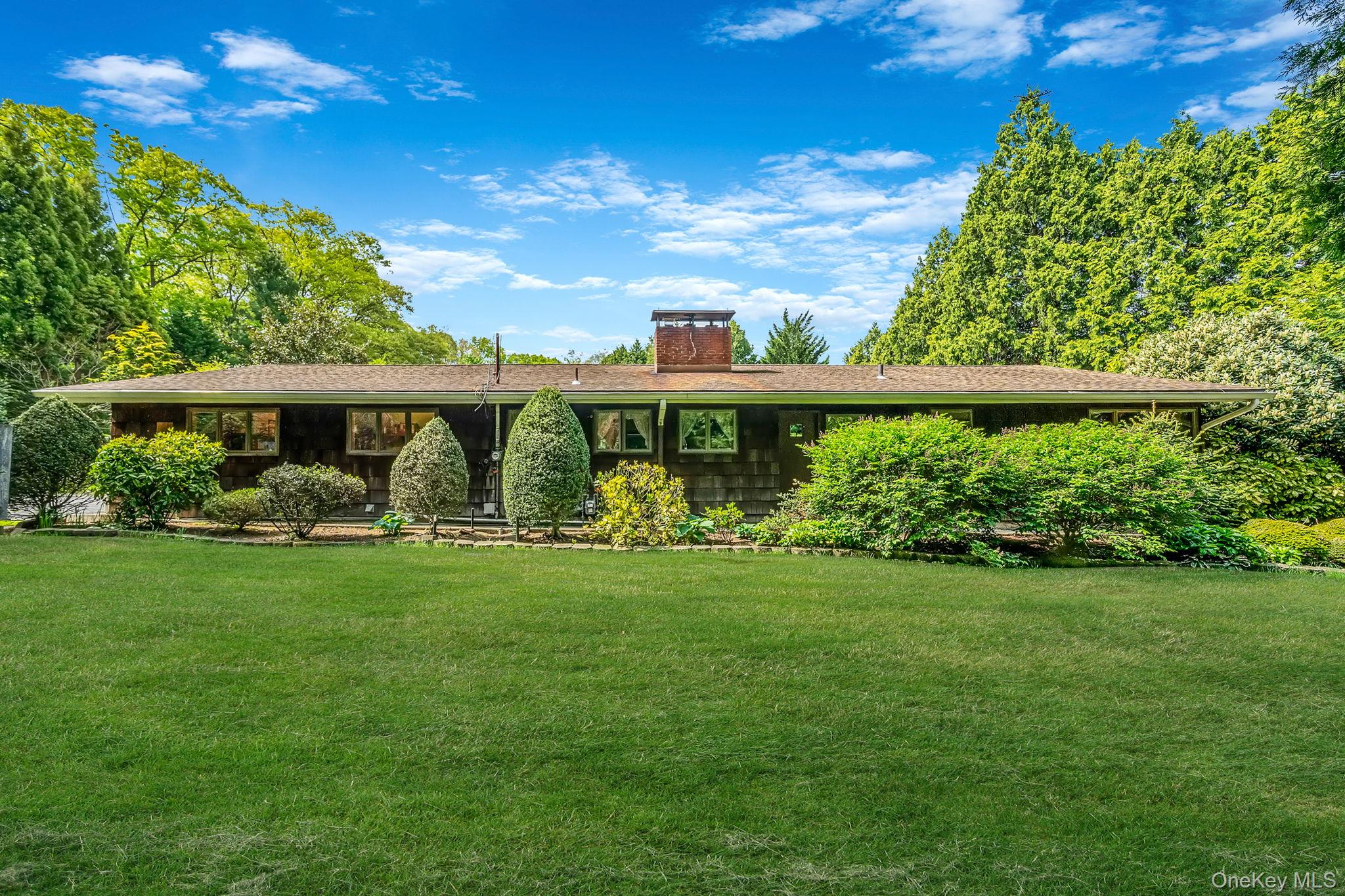 280 Deforest Road North Dix Hills, NY 11746 - Photo 11 of 37 a view of a house with a yard