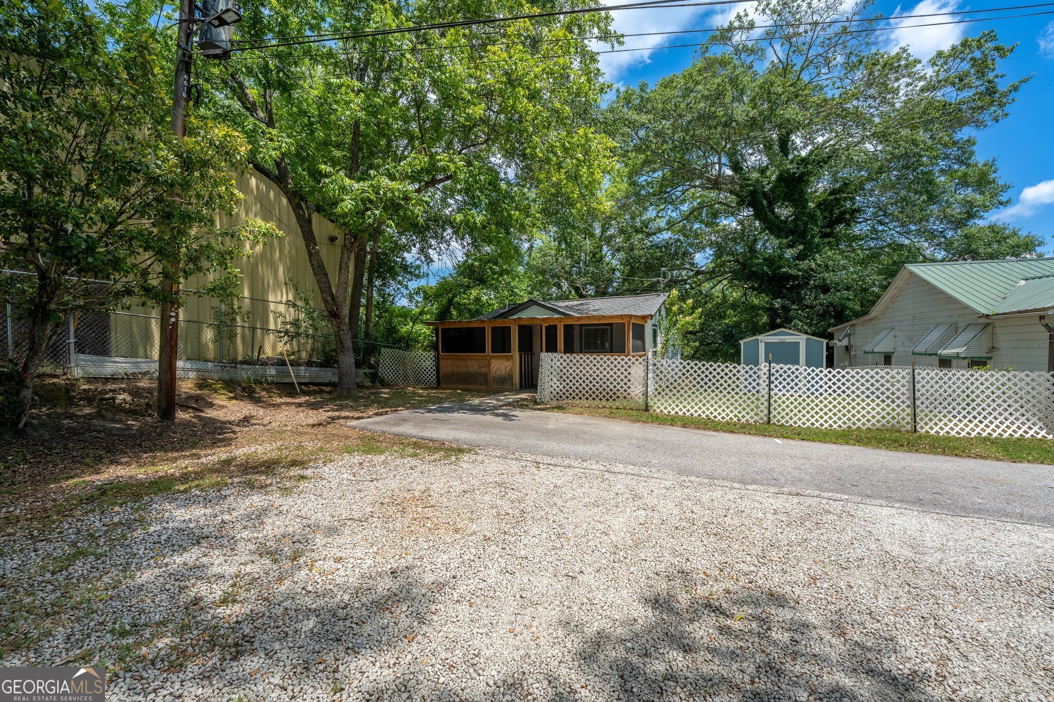 128 Branch Street Toccoa, GA 30577 - Photo 13 of 38 a view of a house with backyard and a tree