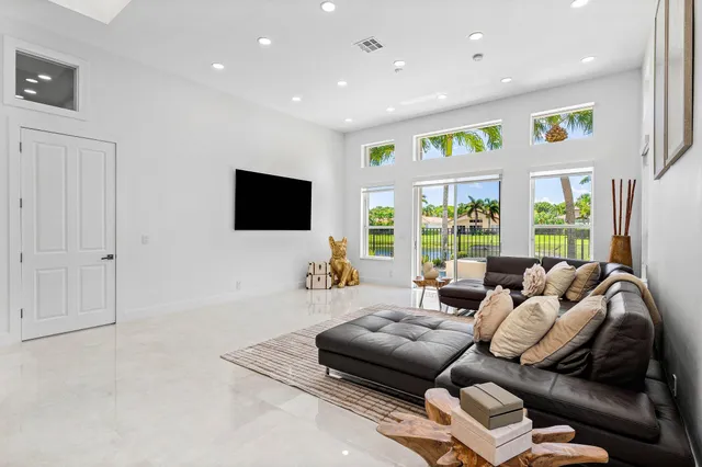 a living room with furniture and a couch