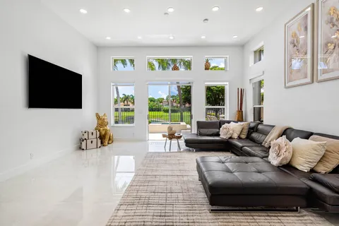 a bathroom with a shower sink and mirror