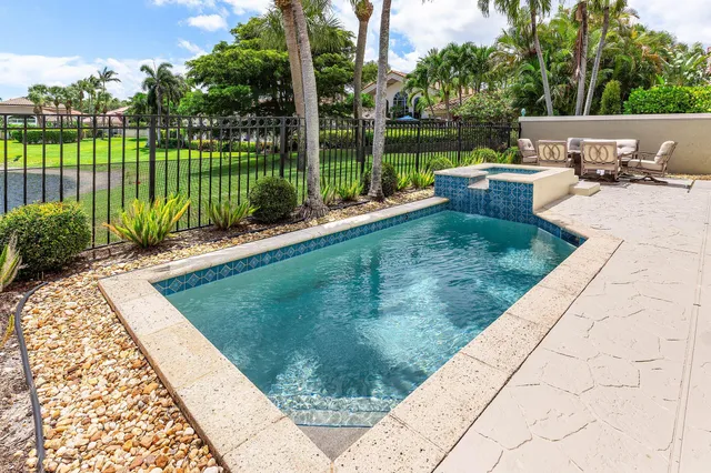 a bathroom with a double vanity sink toilet and shower