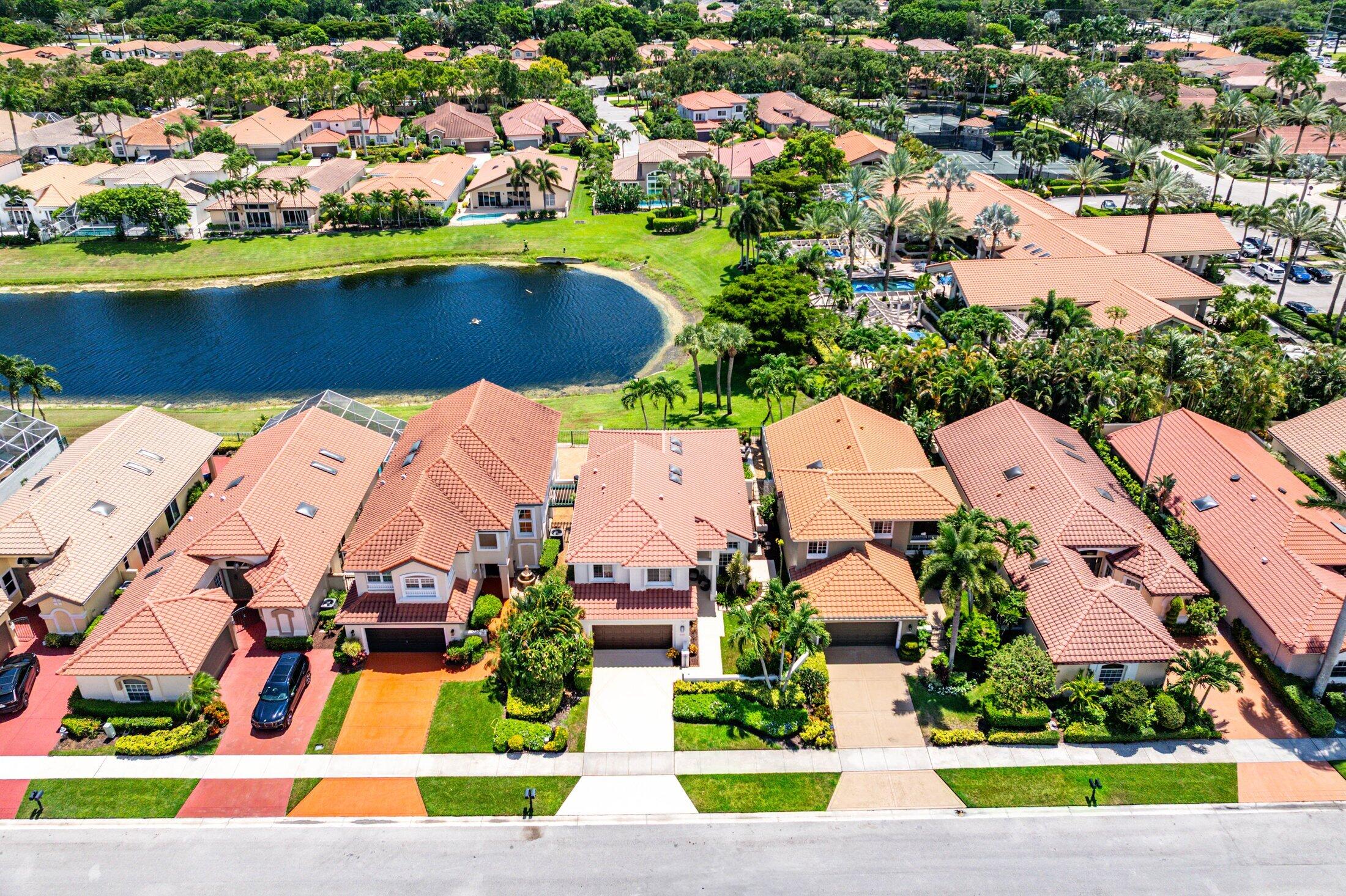 6334 Northwest 24th Street Boca Raton, FL 33434 - Photo 37 of 56 an aerial view of multiple houses with yard