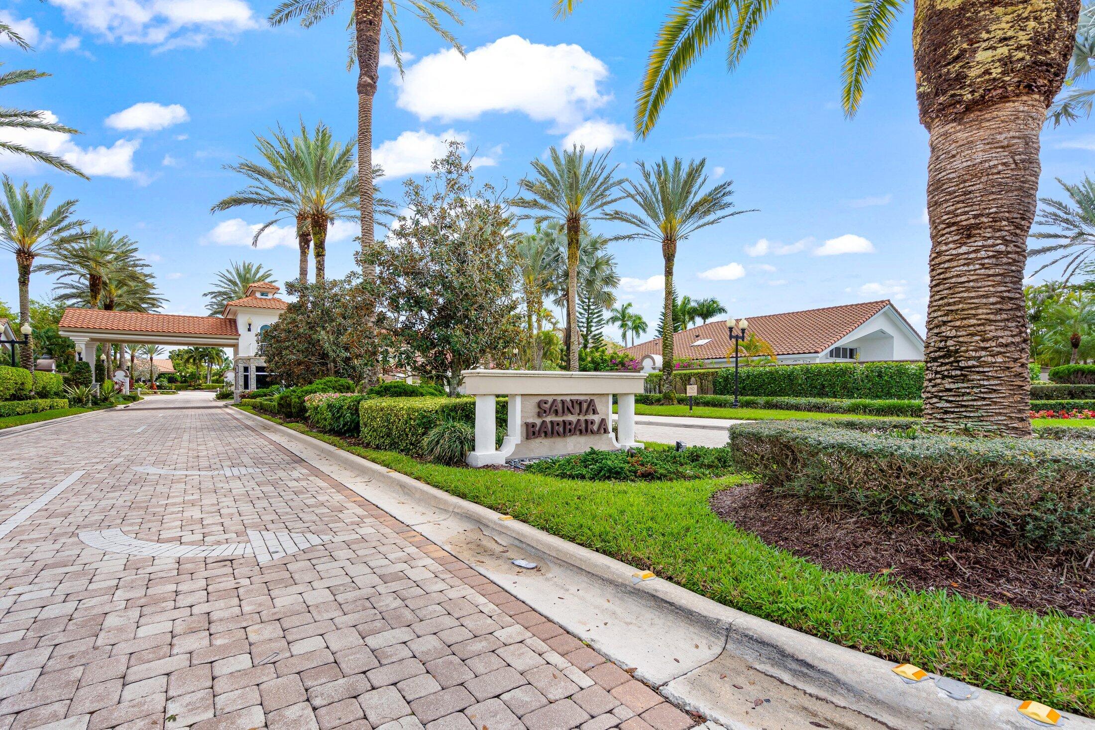 6334 Northwest 24th Street Boca Raton, FL 33434 - Photo 40 of 56 a view of a house with a yard and potted plants