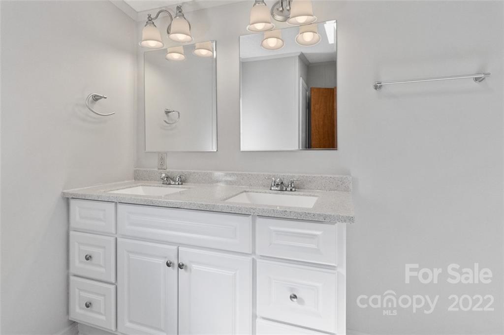 7237 Long Island Road Catawba, NC 28609 - Photo 19 of 36 a bathroom with a sink vanity and mirror