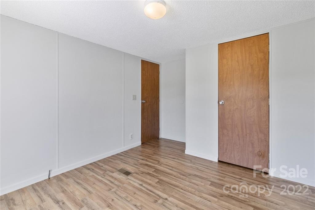7237 Long Island Road Catawba, NC 28609 - Photo 21 of 36 a view of an empty room with wooden floor