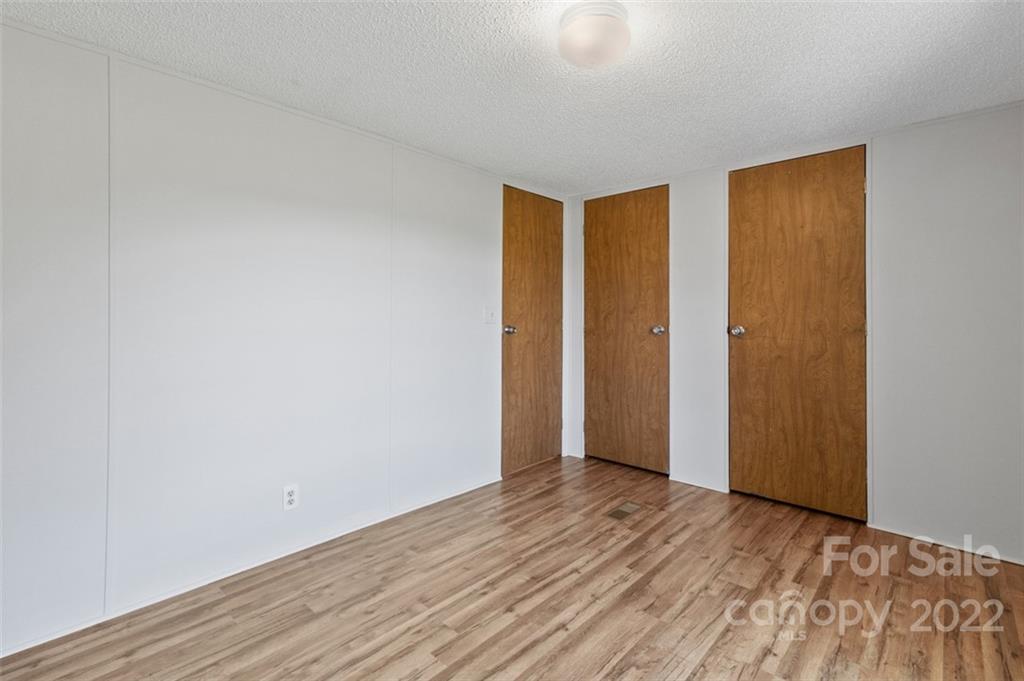 7237 Long Island Road Catawba, NC 28609 - Photo 25 of 36 a view of an empty room with wooden floor