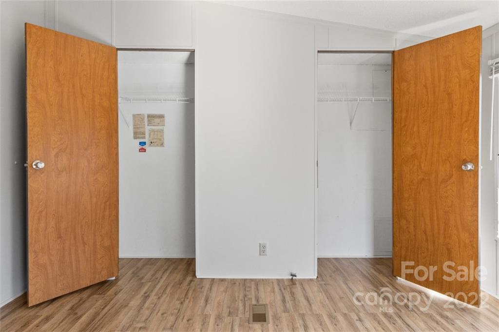 7237 Long Island Road Catawba, NC 28609 - Photo 28 of 36 a view of a room with wooden floor and a sliding door