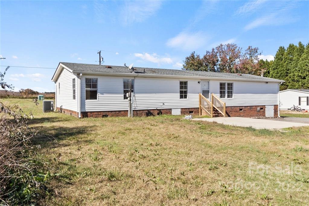 7237 Long Island Road Catawba, NC 28609 - Photo 36 of 36 a view of a house with backyard and trees