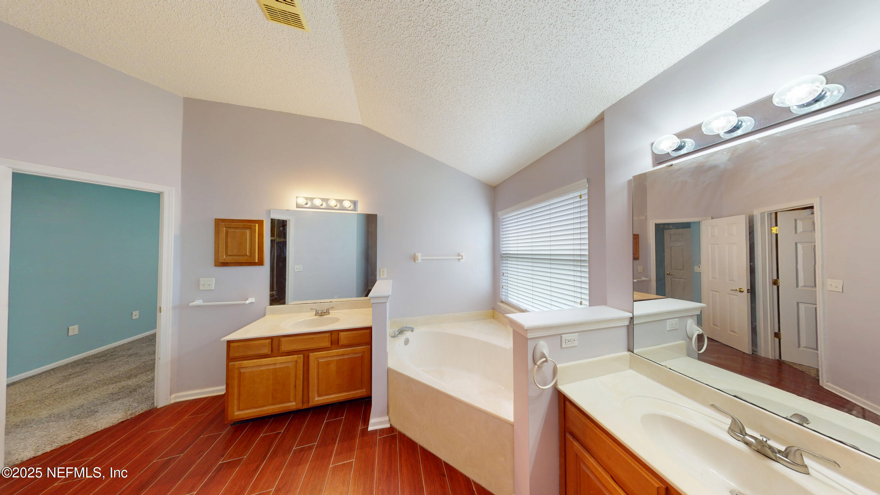 2933 Turning Leaf Lane Jacksonville, FL 32221 - Photo 15 of 22 a room with a bed and a view of living room