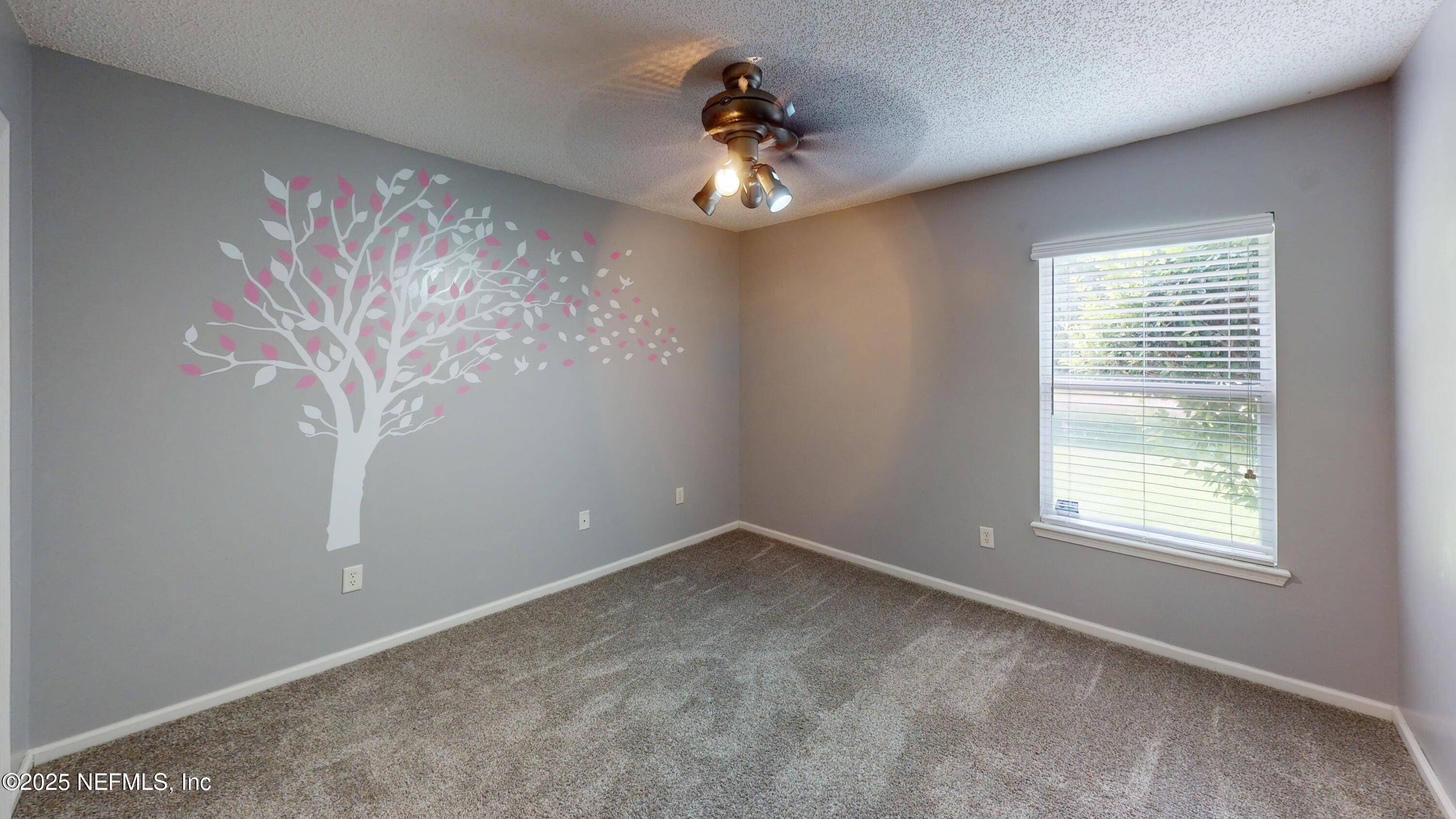 2933 Turning Leaf Lane Jacksonville, FL 32221 - Photo 18 of 22 a view of empty room with window