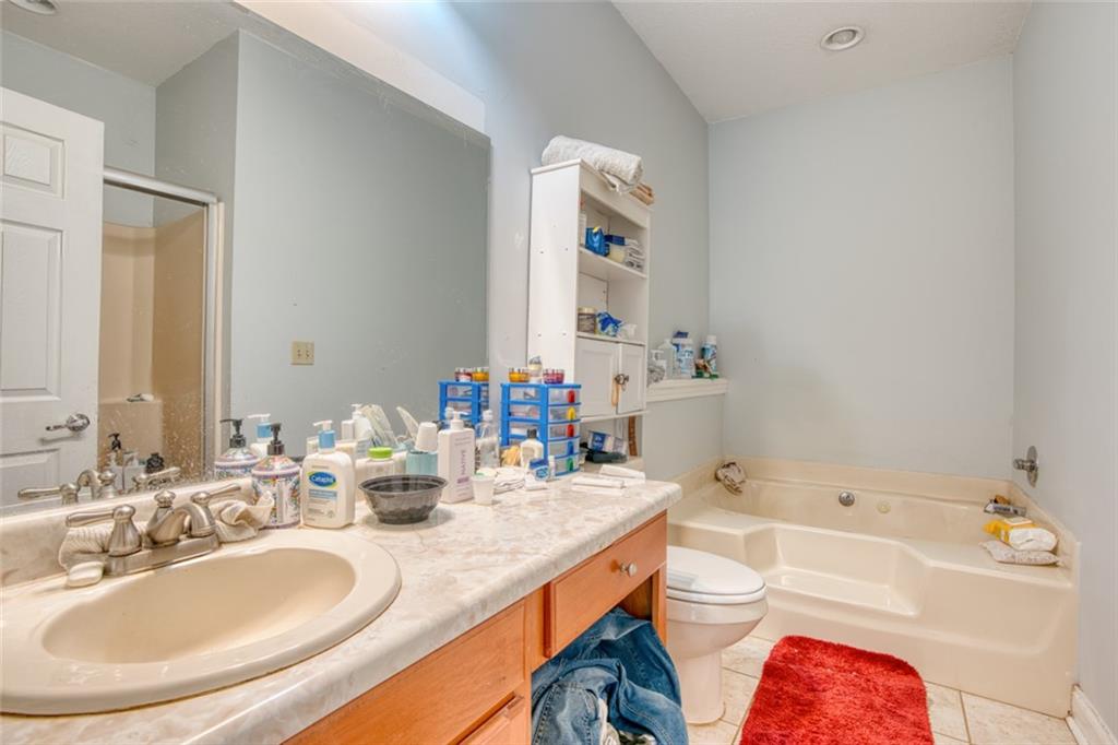 441 Weaver Road Moultrie, GA 31768 - Photo 16 of 48 a bathroom with a sink and a mirror