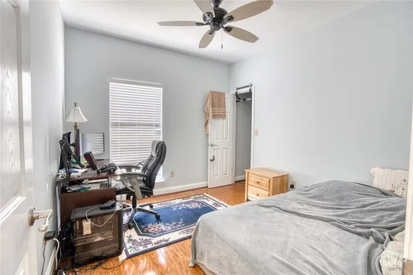 a living room with furniture rug and window