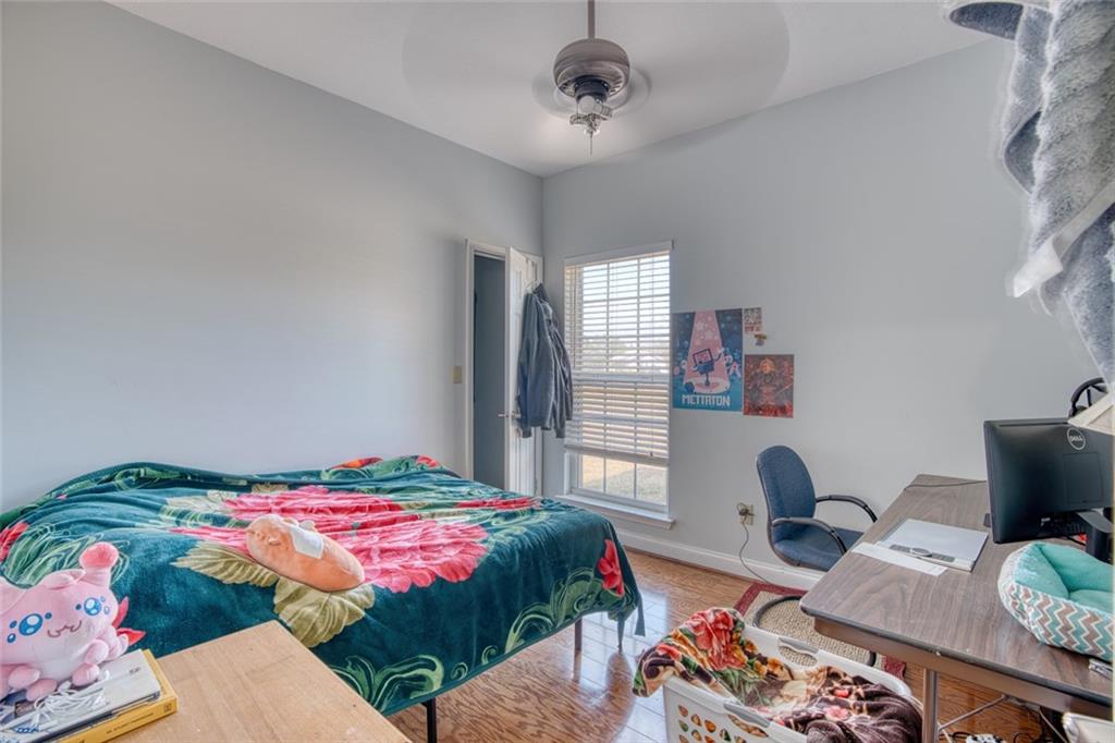 441 Weaver Road Moultrie, GA 31768 - Photo 22 of 48 a bedroom with bed and a window