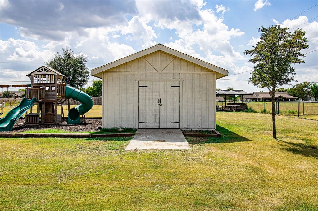 328 Meadow Lane Red Oak, TX 75154 - Photo 31 of 35 View of shed featuring a playground