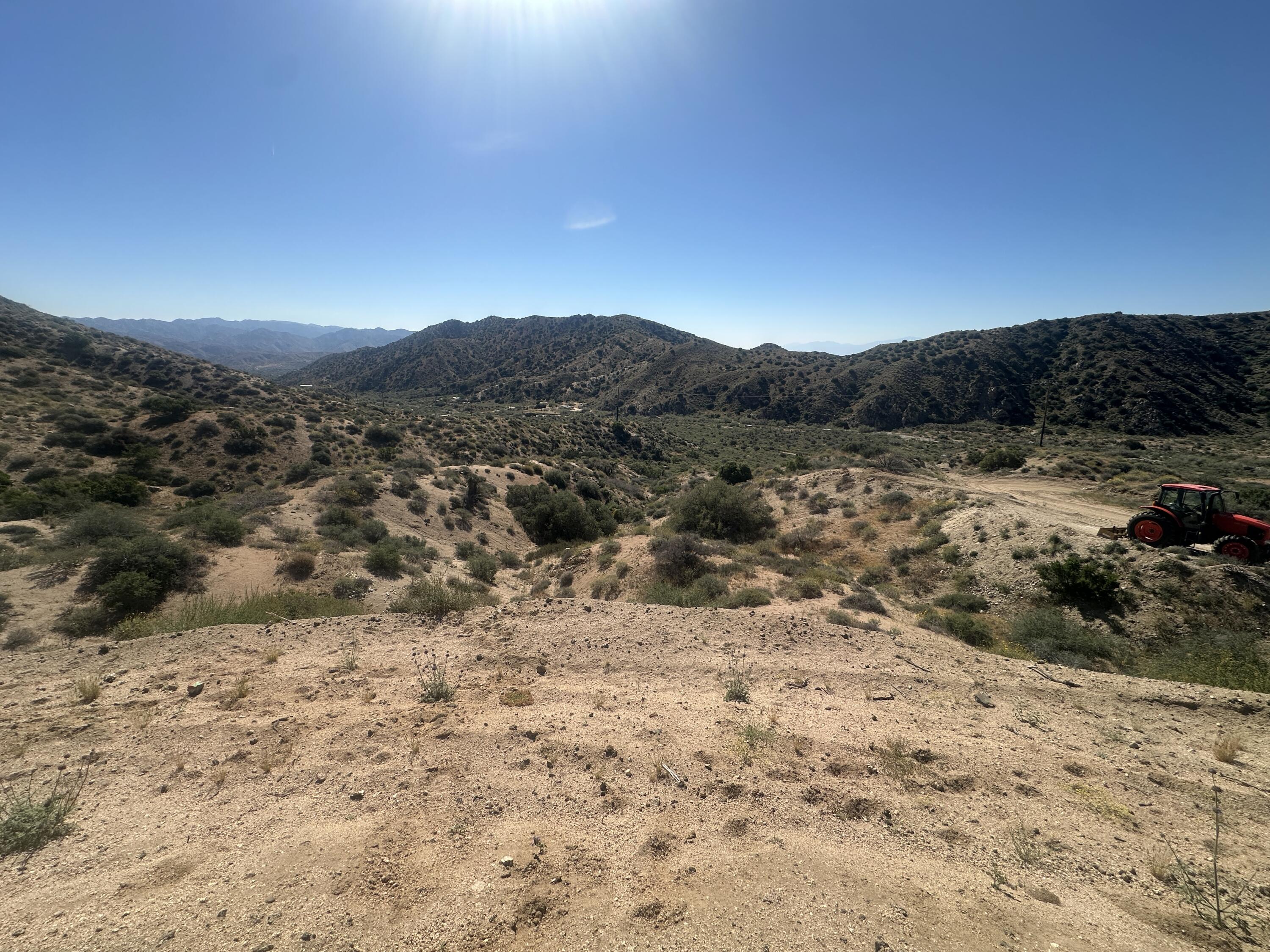 48980 Big Morongo Canyon Road Morongo Valley, CA 92256 - Photo 9 of 11 a view of a dry yard with green space