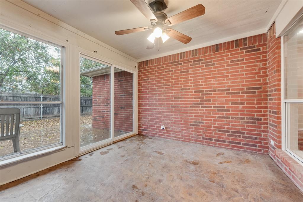 617 Madeline Court Azle, TX 76020 - Photo 11 of 20 Unfurnished sunroom with a ceiling fan