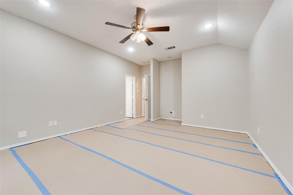 617 Madeline Court Azle, TX 76020 - Photo 16 of 20 Spare room with lofted ceiling, recessed lighting, and ceiling fan