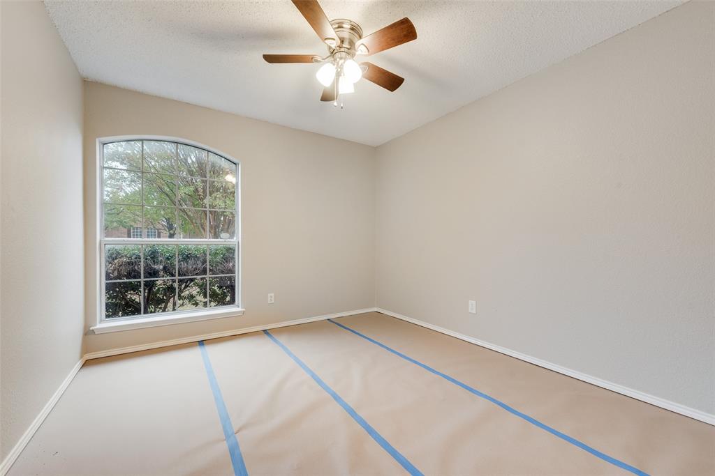 617 Madeline Court Azle, TX 76020 - Photo 2 of 20 Spare room with ceiling fan and a textured ceiling
