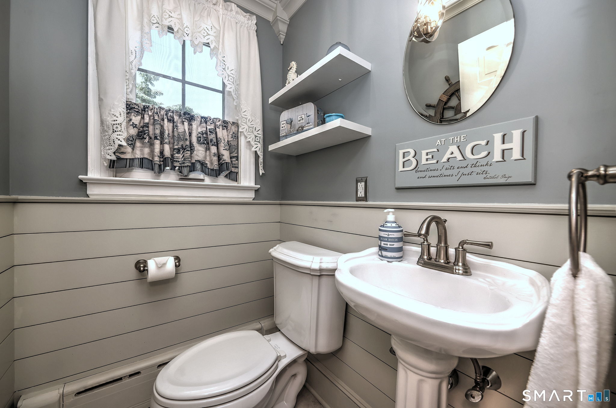 376 Stratford Road Stratford, CT 06615 - Photo 21 of 40 Beautifully Renovated Half Bath with Modern Finishes and Timeless Style.
