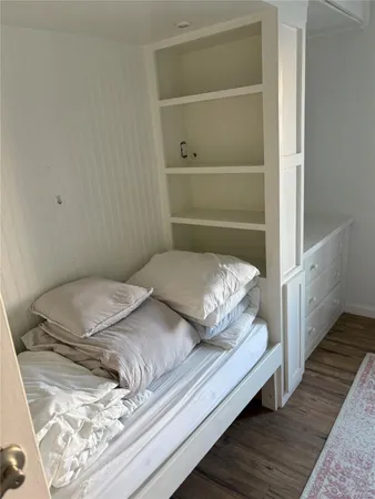 a bathroom with a shower and a toilet