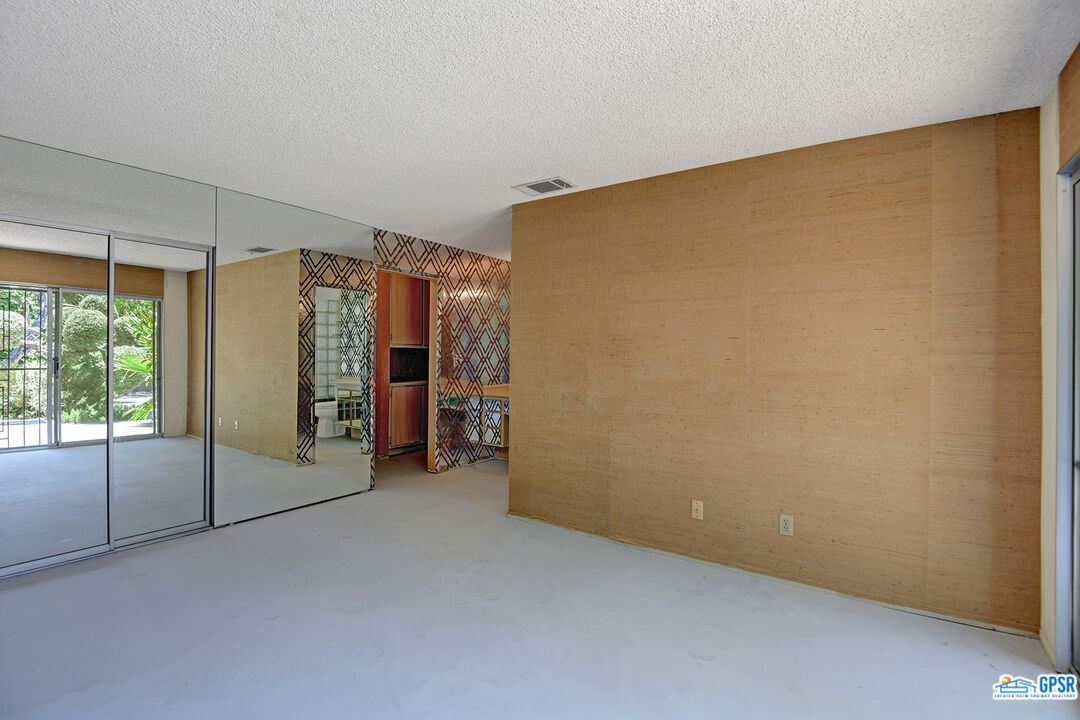 2189 East Sonora Road Palm Springs, CA 92264 - Photo 17 of 29 a view of empty room with floor to ceiling window