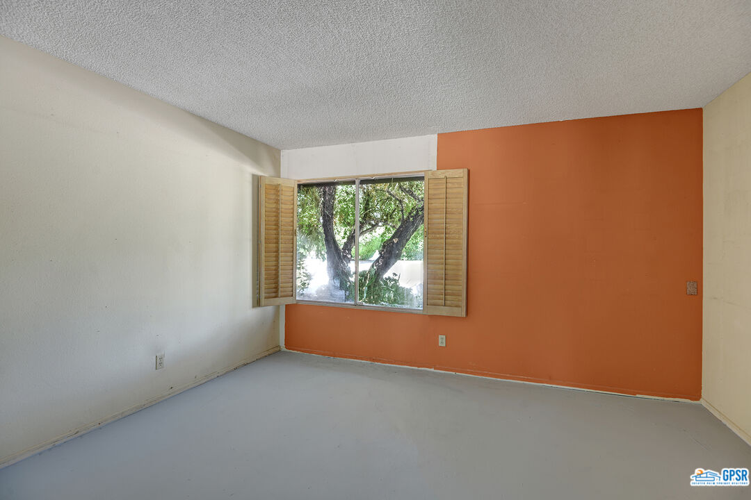 2189 East Sonora Road Palm Springs, CA 92264 - Photo 29 of 29 an empty room with windows