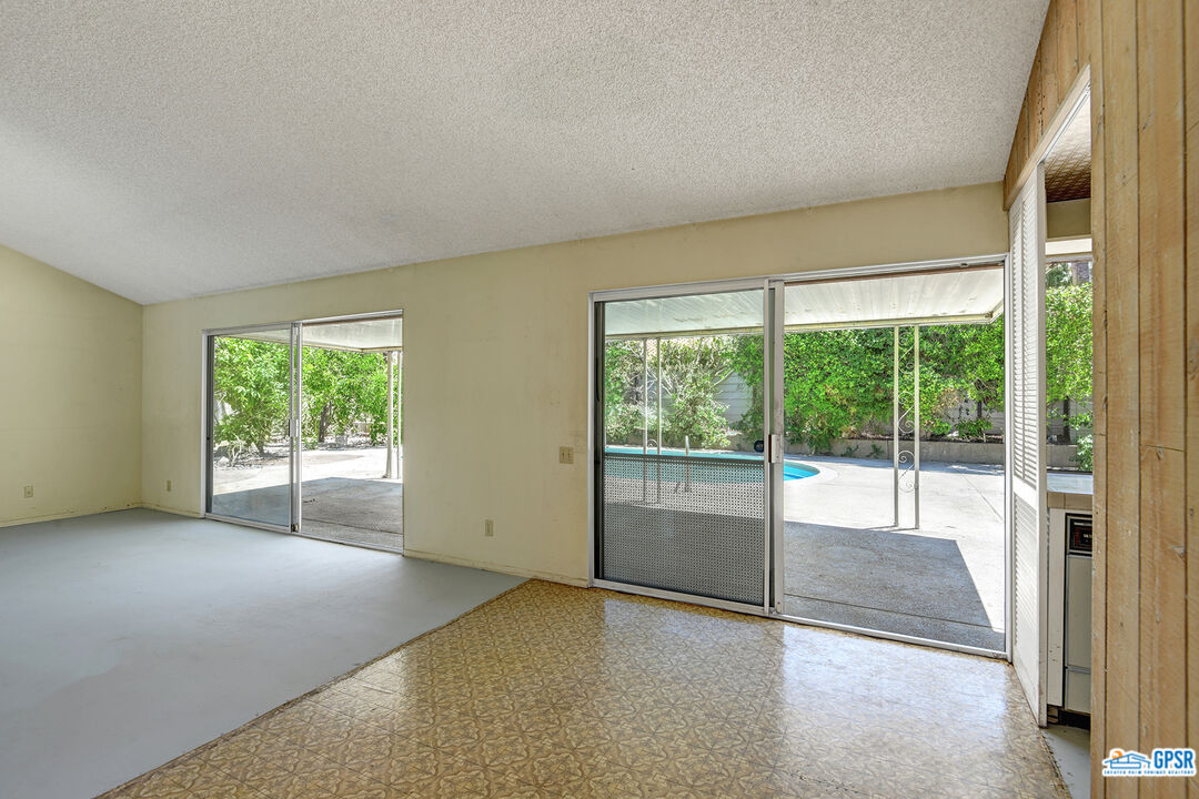 2189 East Sonora Road Palm Springs, CA 92264 - Photo 7 of 29 a view of an empty room with a window