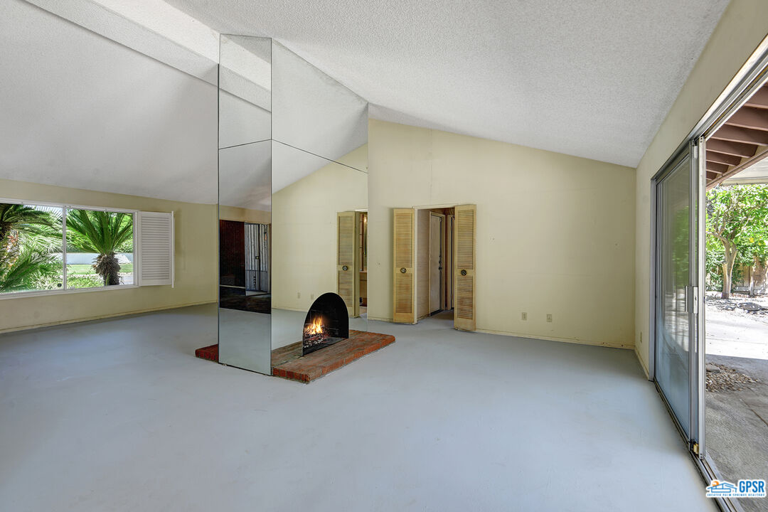 2189 East Sonora Road Palm Springs, CA 92264 - Photo 10 of 29 a view of an empty room with windows