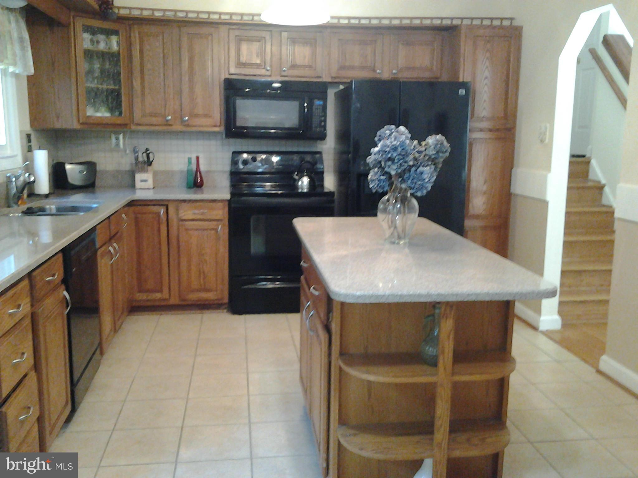 6709 Burch Hill Road Brandywine, MD 20613 - Photo 8 of 25 Remodeled Island Kitchen