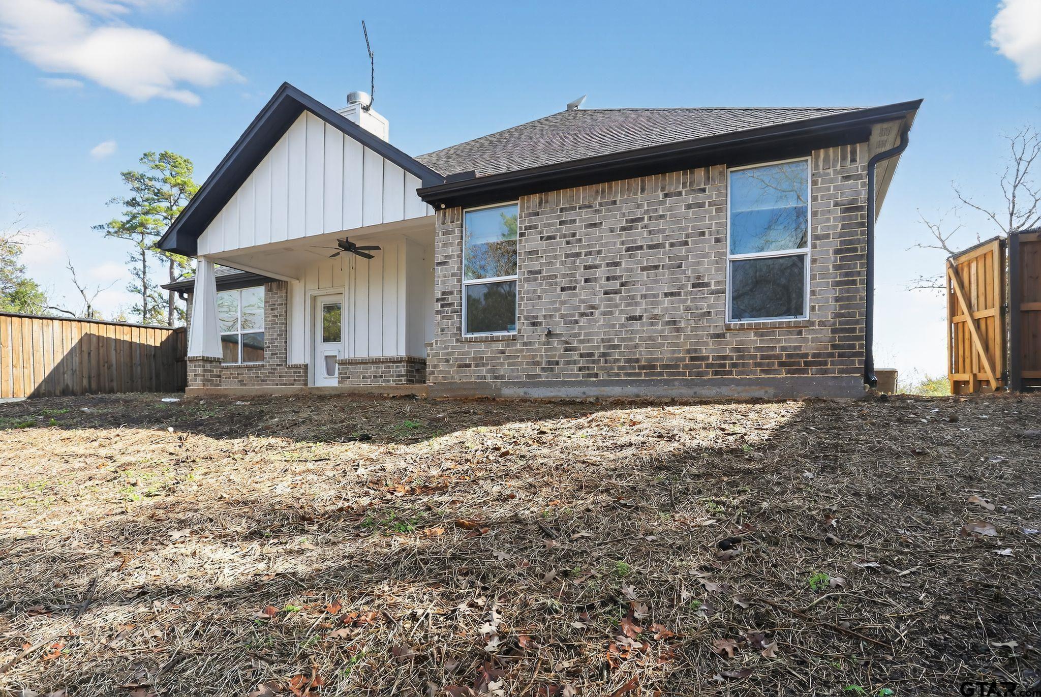 7600 County Road 210 Tyler, TX 75702 - Photo 30 of 30 a front view of a house with garden