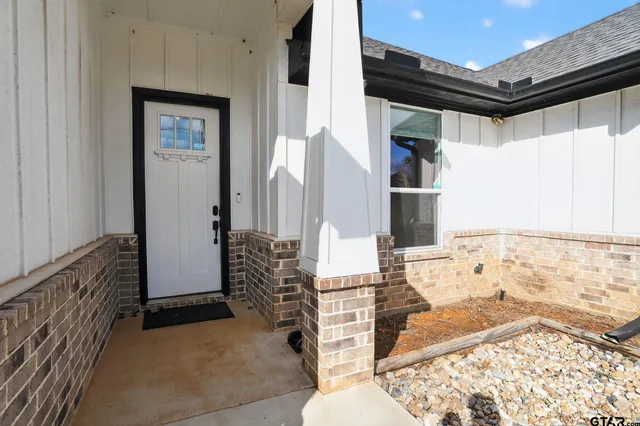 a view of living room filled with furniture