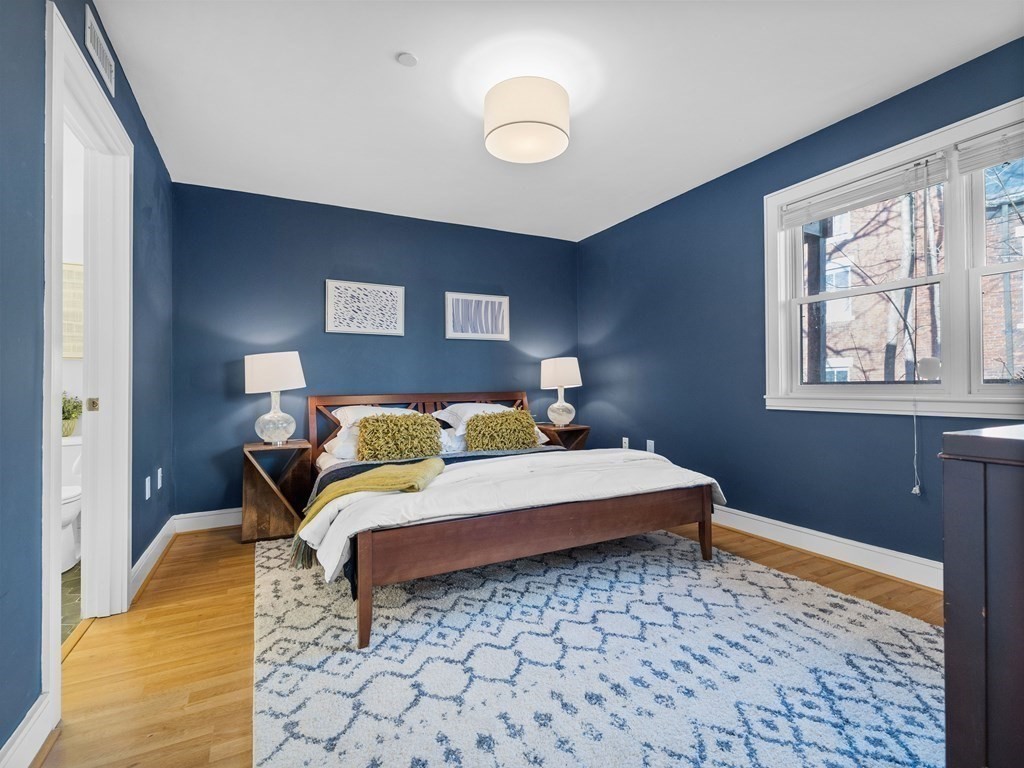 2 Boylston Street, Unit 4 Boston, MA 02130 - Photo 12 of 30 a bedroom with a bed and a window