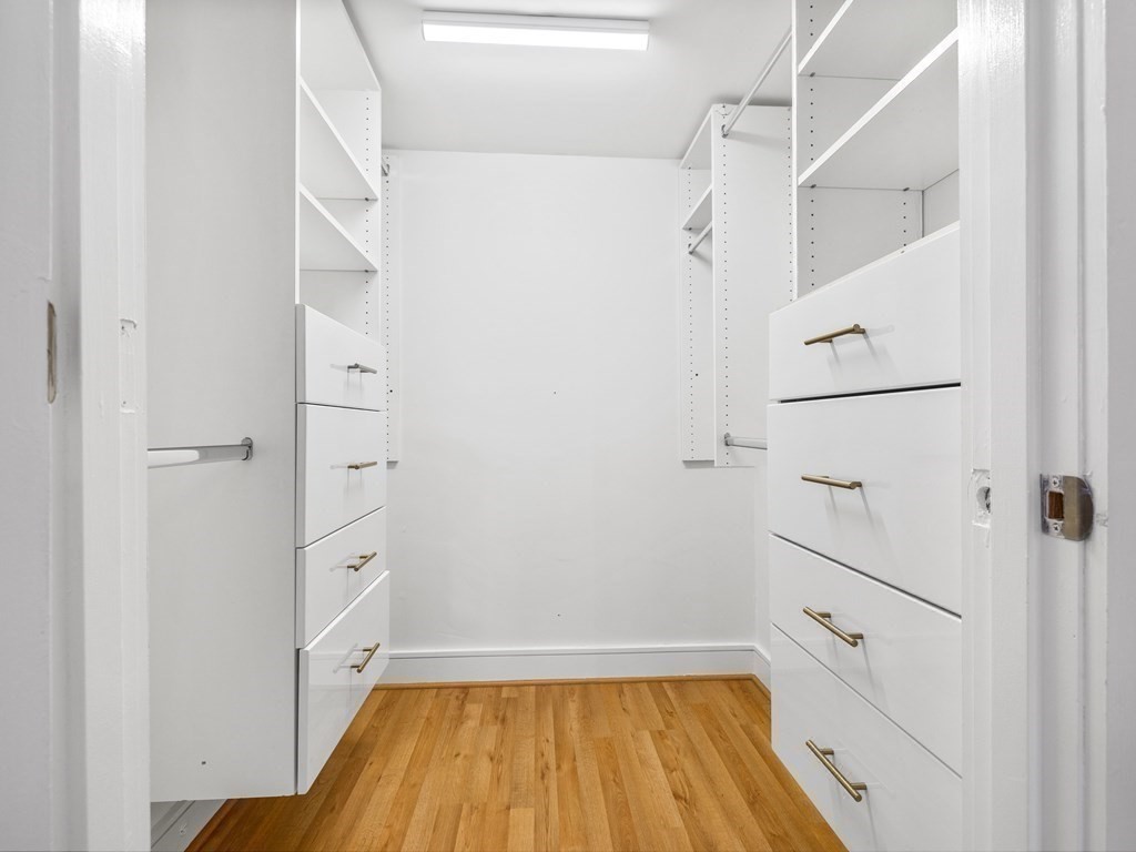 2 Boylston Street, Unit 4 Boston, MA 02130 - Photo 16 of 30 a view of walk in closet with empty racks
