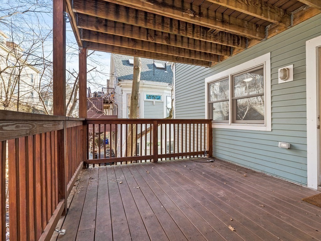2 Boylston Street, Unit 4 Boston, MA 02130 - Photo 27 of 30 a view of a balcony with wooden floor