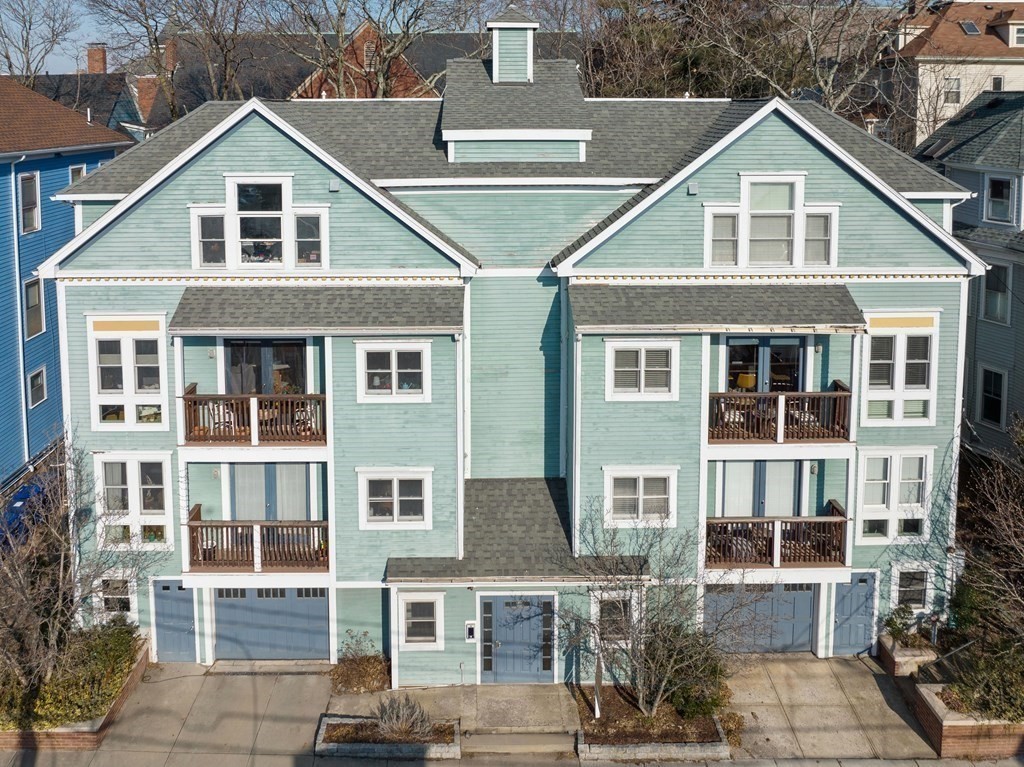 2 Boylston Street, Unit 4 Boston, MA 02130 - Photo 28 of 30 a front view of a house with a yard