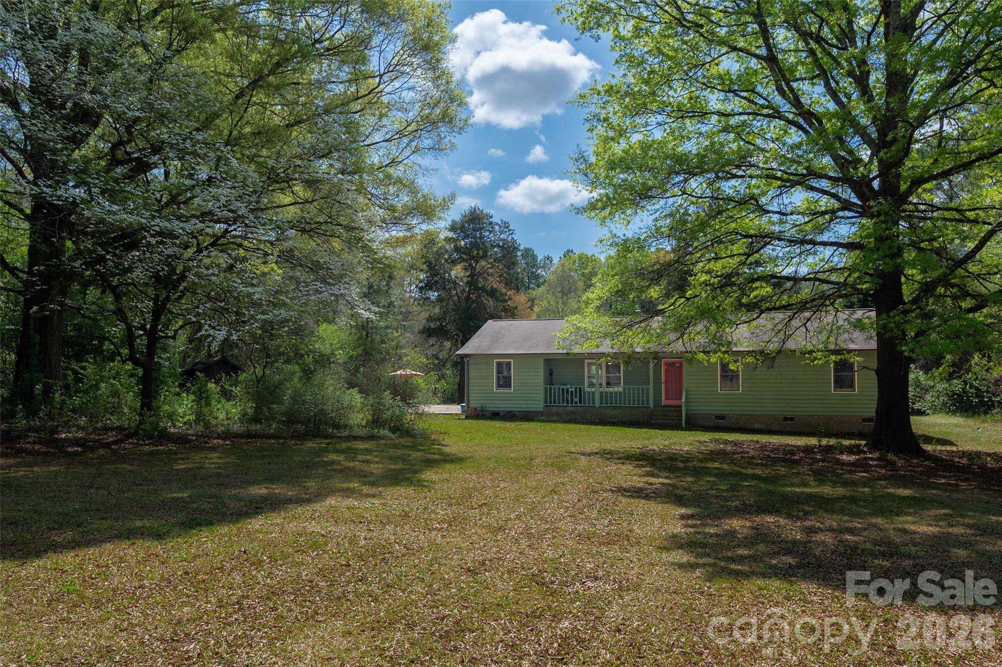 5219 New Town Road Waxhaw, NC 28173 - Photo 1 of 35 a view of a house with a yard