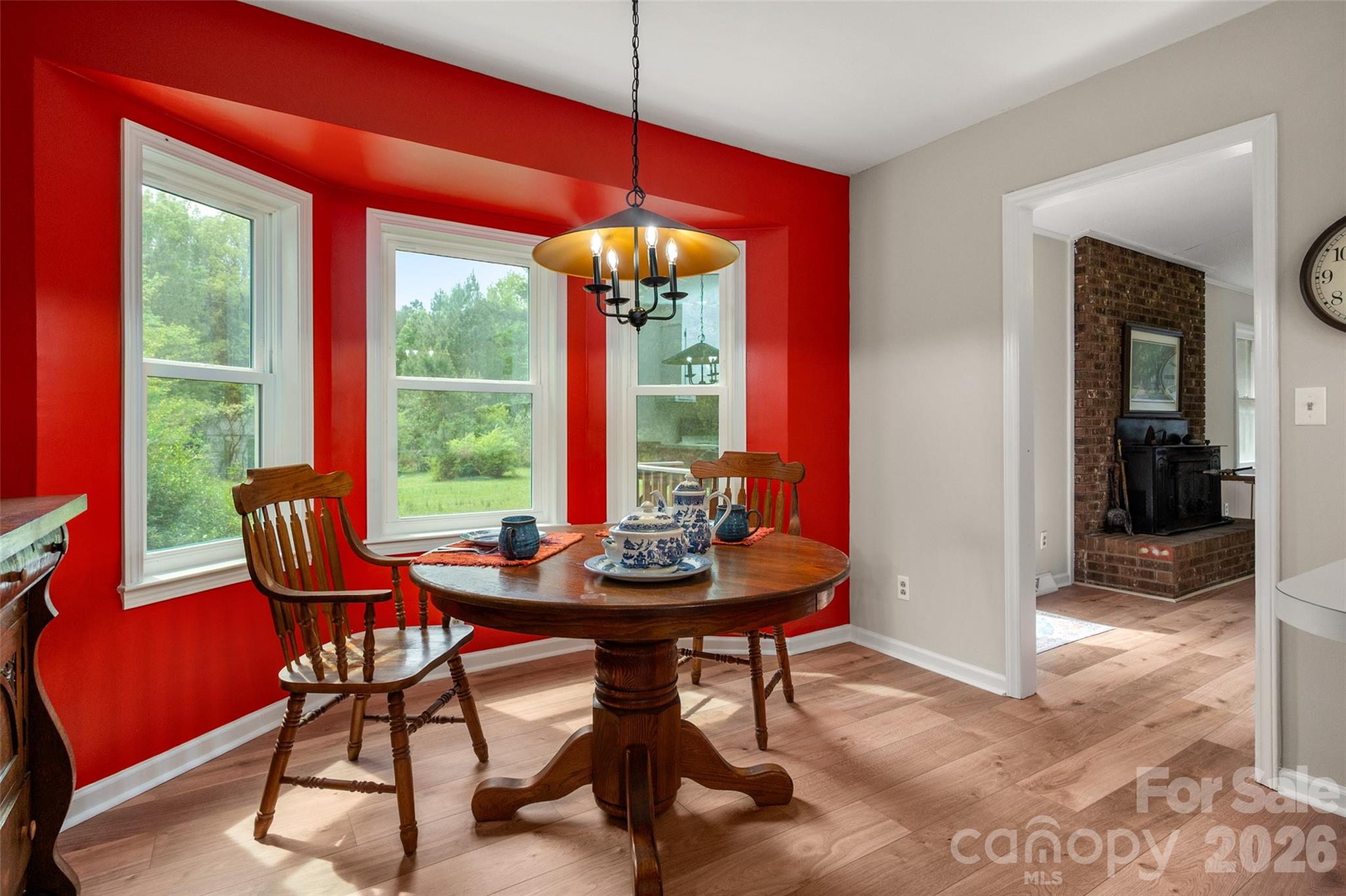 5219 New Town Road Waxhaw, NC 28173 - Photo 13 of 35 a dining room with a table and chairs