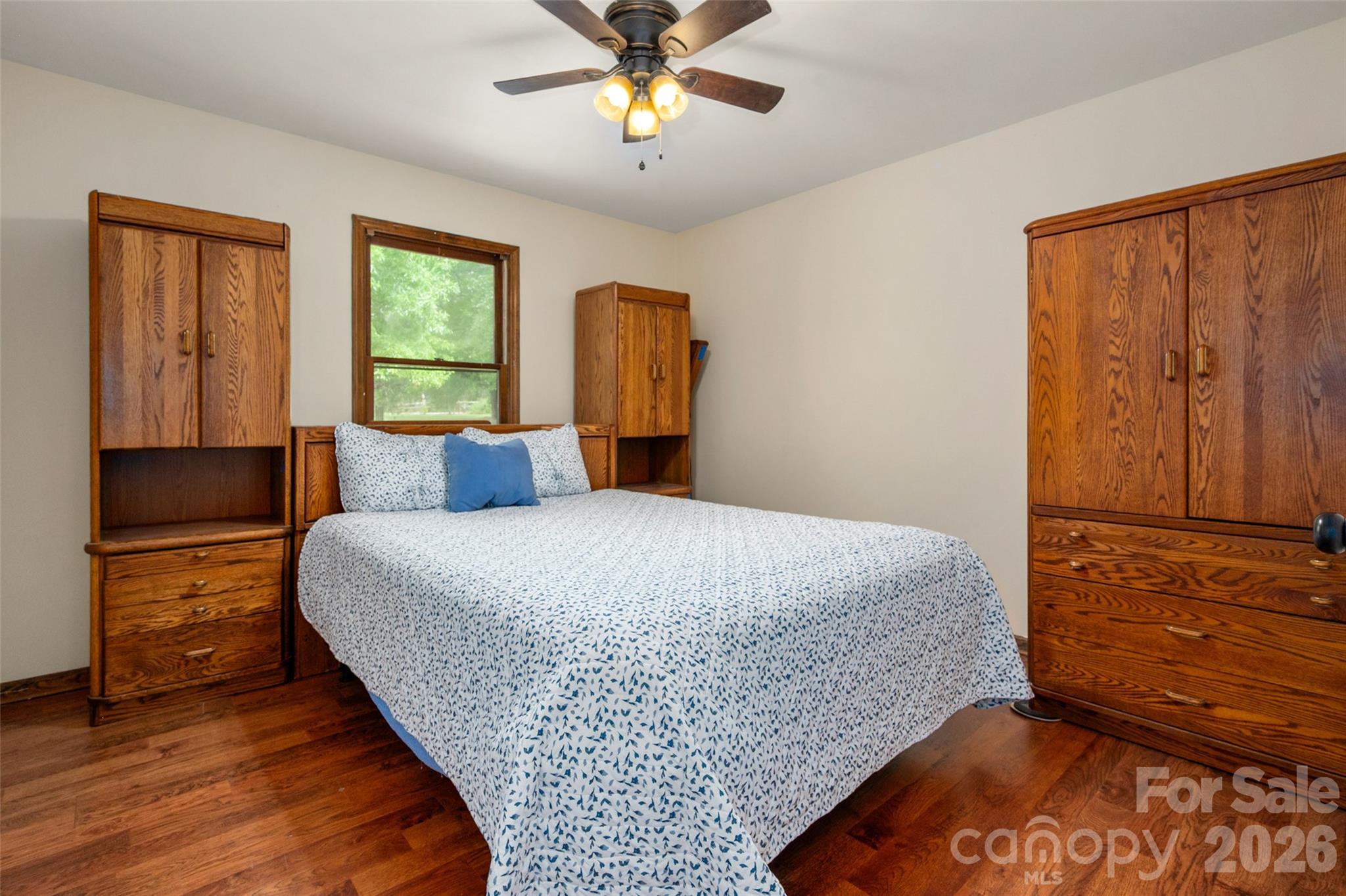 5219 New Town Road Waxhaw, NC 28173 - Photo 23 of 35 a bedroom with a bed and a dresser