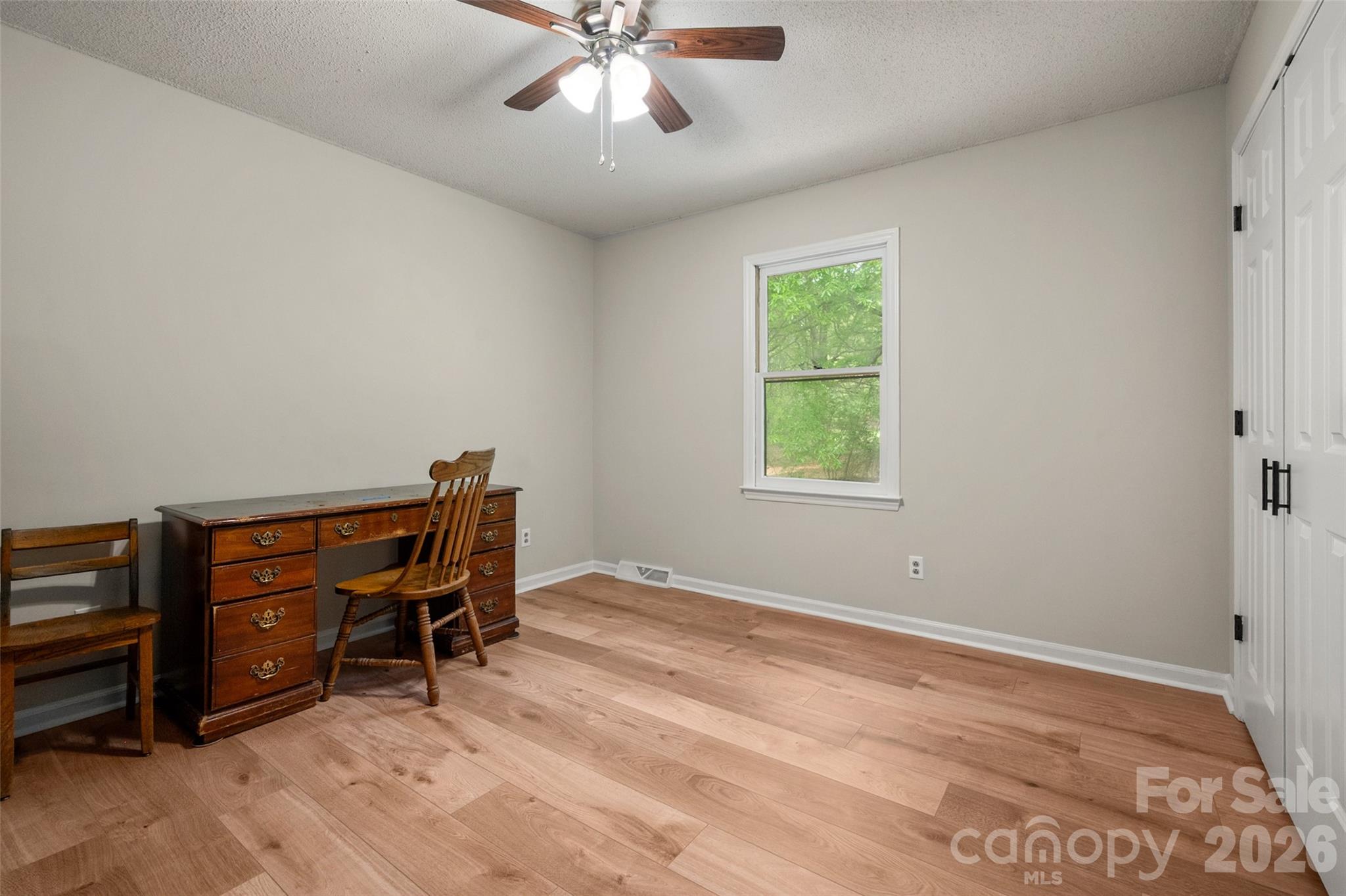 5219 New Town Road Waxhaw, NC 28173 - Photo 24 of 35 a view of room with workspace and windows